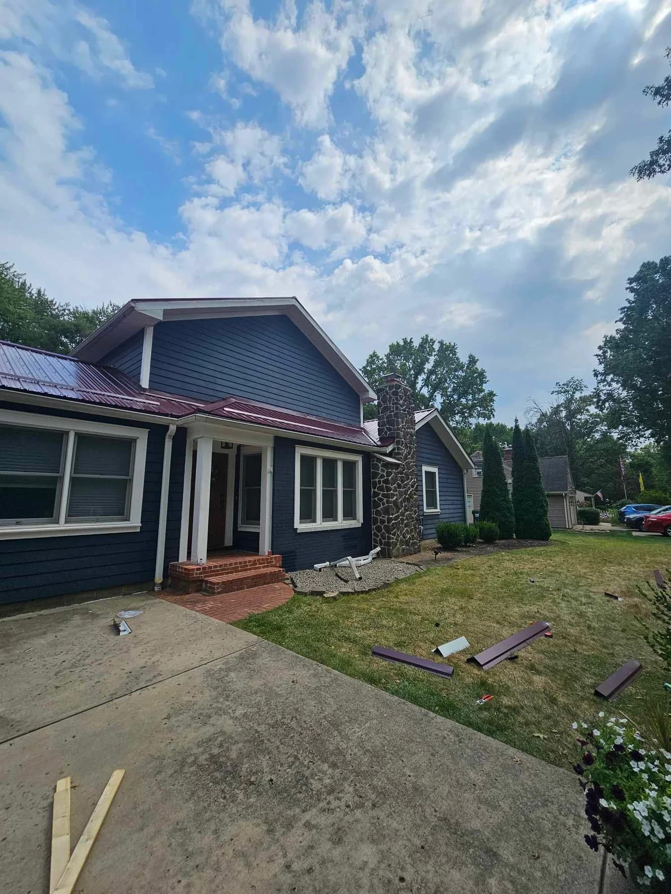 Blue Exterior with Metal Accent Roof