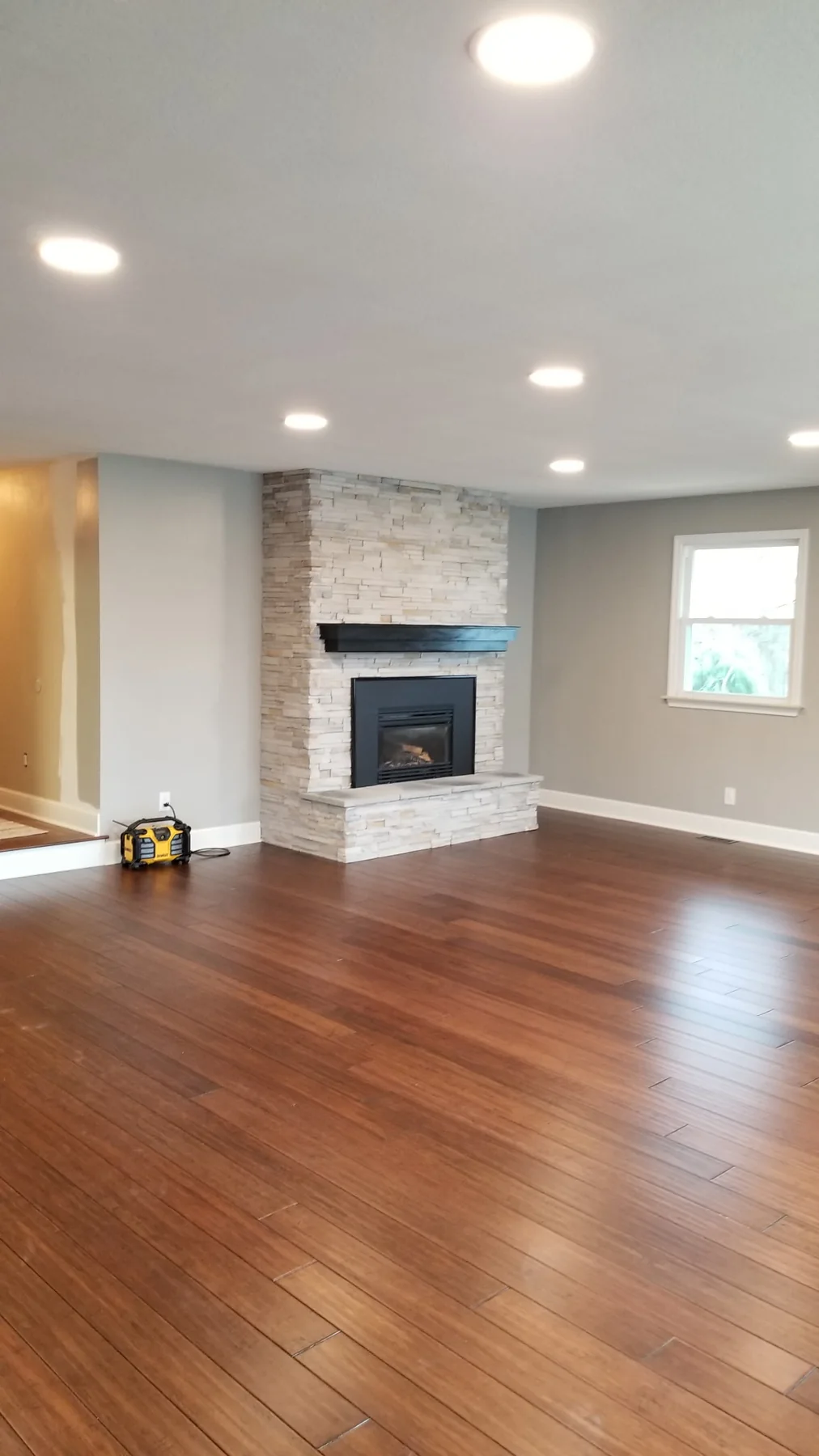 Living Room Flooring and Fireplace Finish